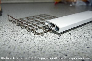 Gitter in Rahmensytem einschieben